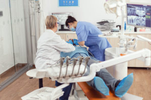 stomatologist senior woman doing hygienic cleaning 2022 01 19 00 15 21 utc 1
